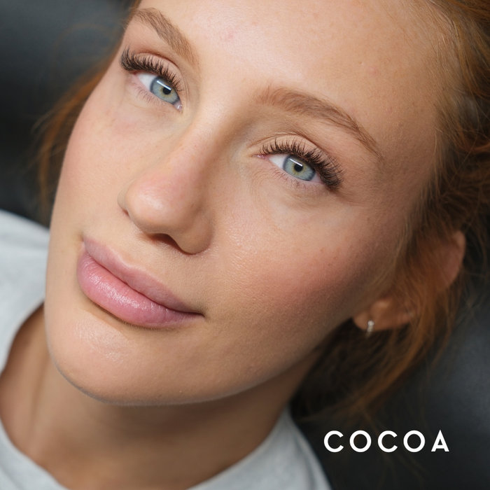 Model wearing EBL Cocoa Brown Lash Extensions – dark brown lashes with soft definition and depth, CC curl