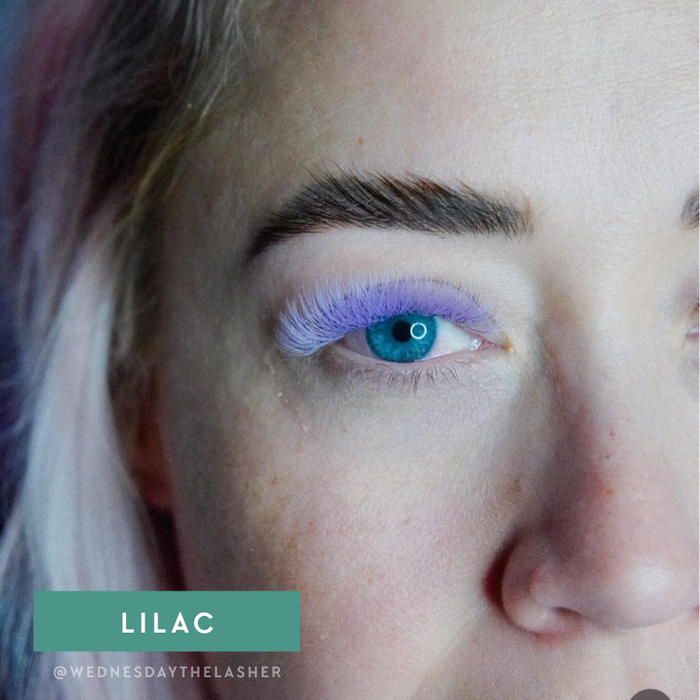 Model wearing EBL Lilac Colored Lash Extensions – soft pastel lashes for creative lash sets and accent styling
