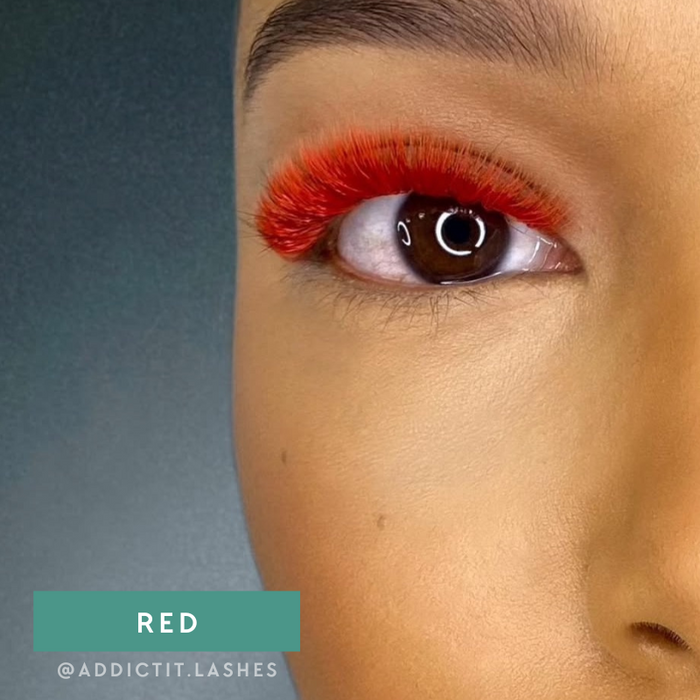 Model wearing EBL Red Colored Lash Extensions – vibrant lash set for creative and fantasy lash looks